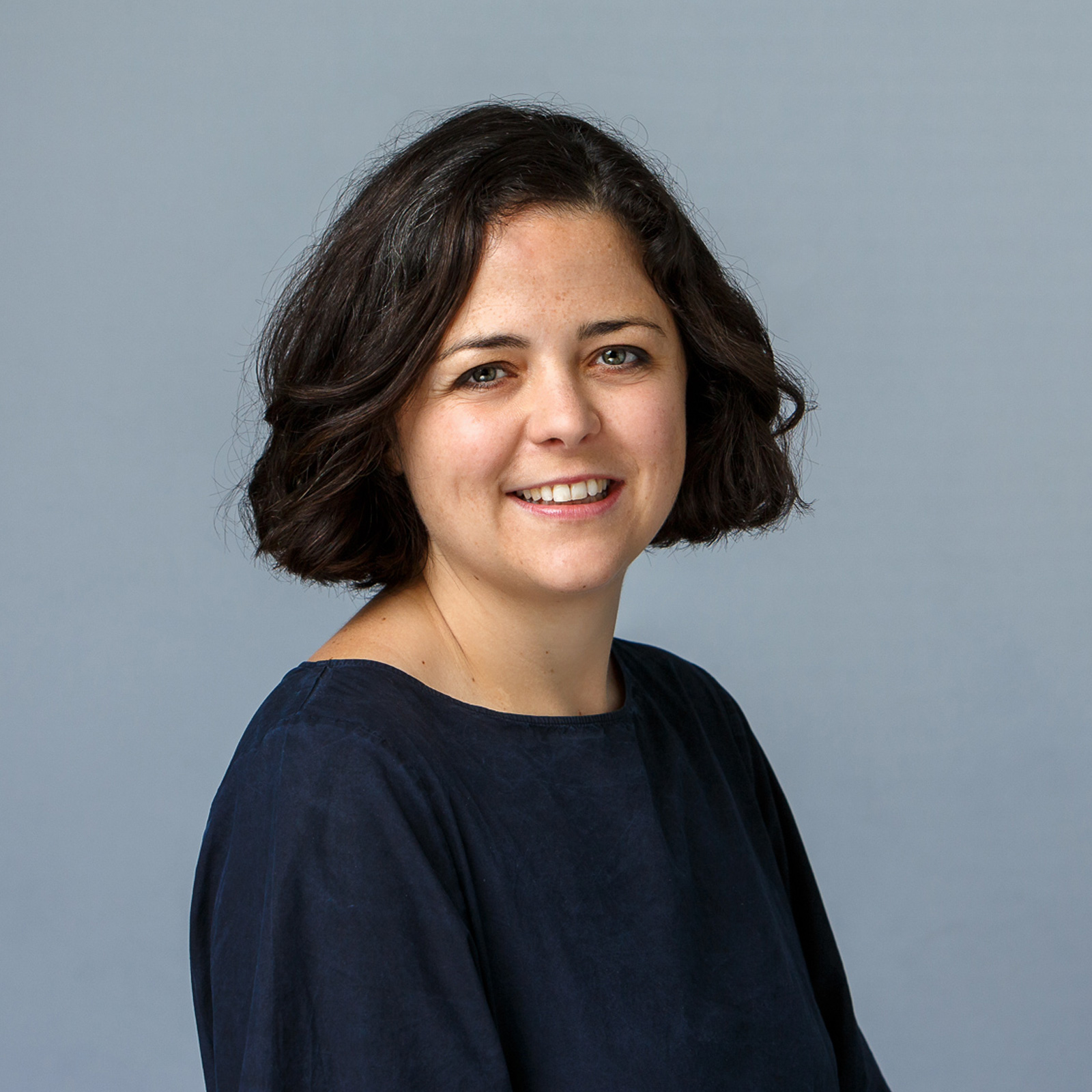 Maryann Hanratty who is the UX Designer at SilverCloud Health, and is wearing a navy blue blouse.